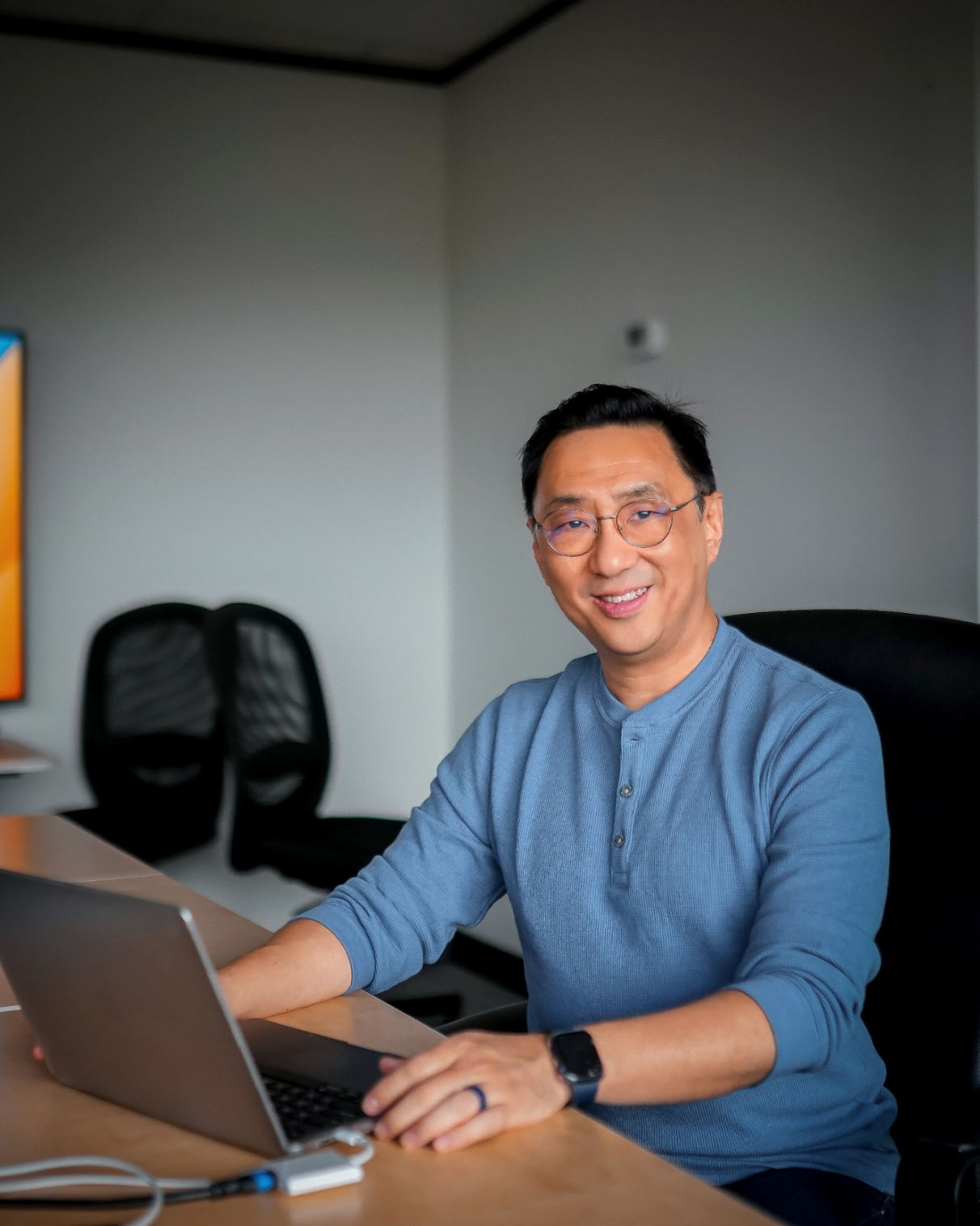 Dr. Carl Thong at work in the Singapore office