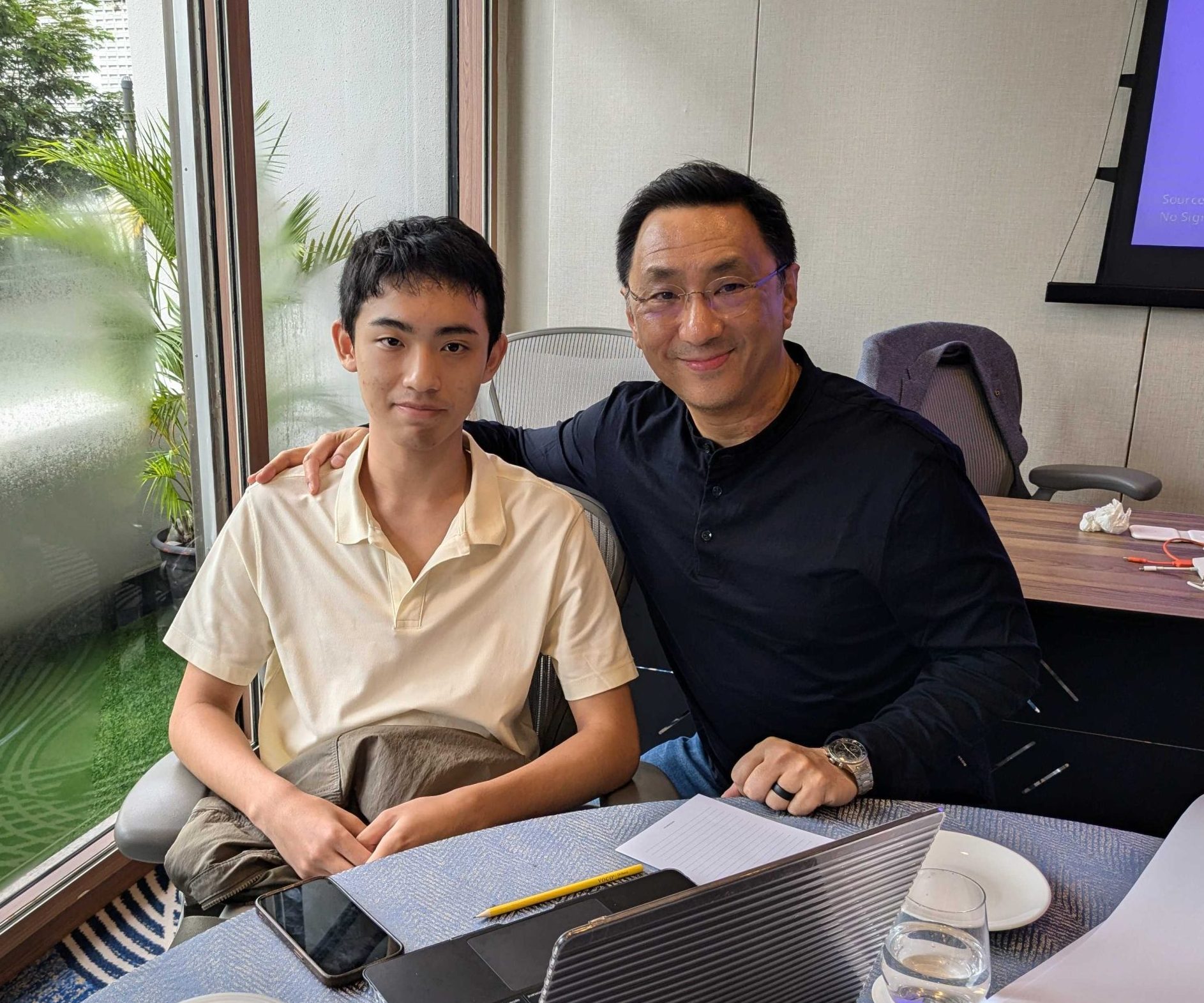 Ethan Thong and Dr. Carl Thong working together